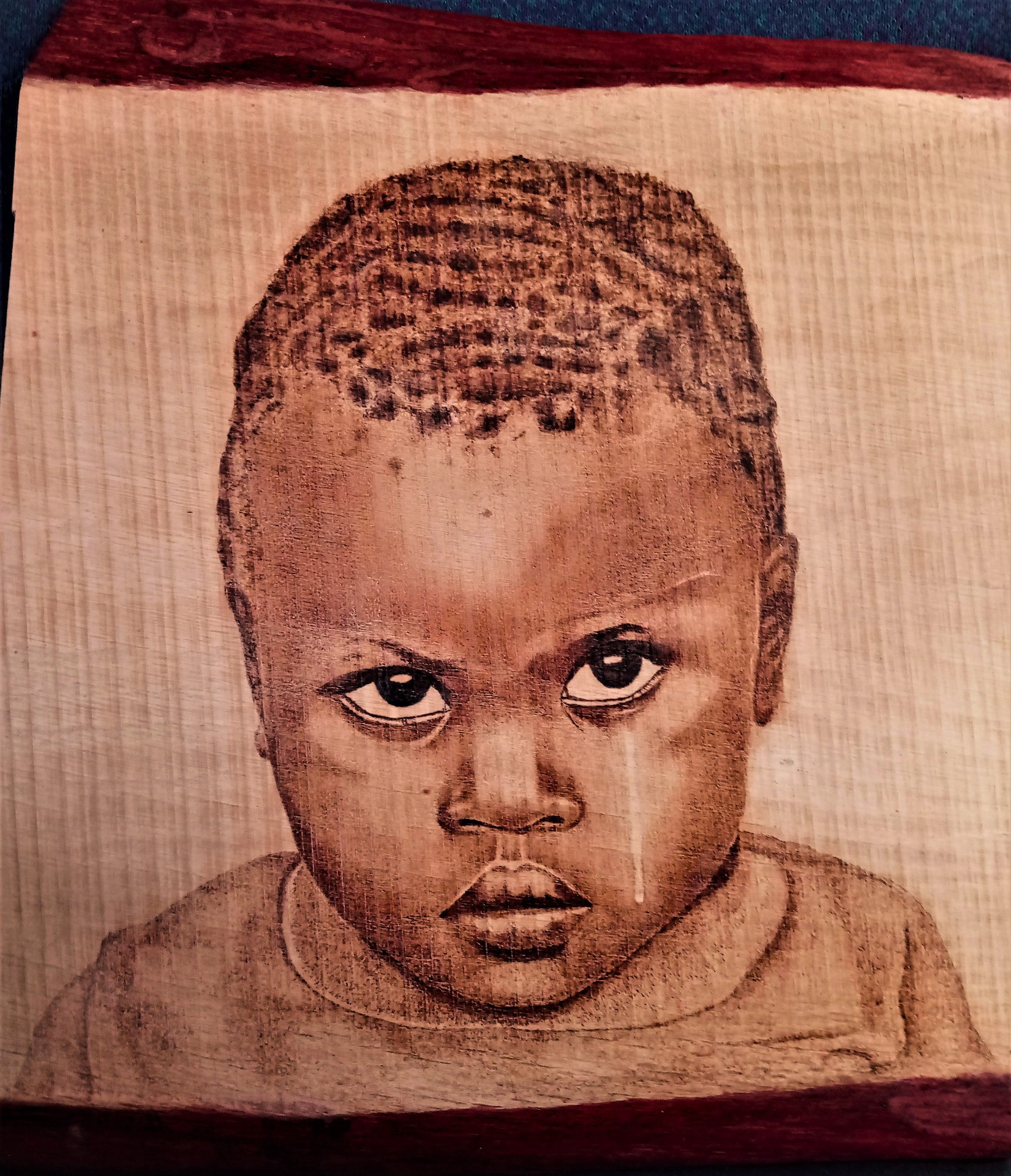 Révolté (bois de pin) 35cmx25cm